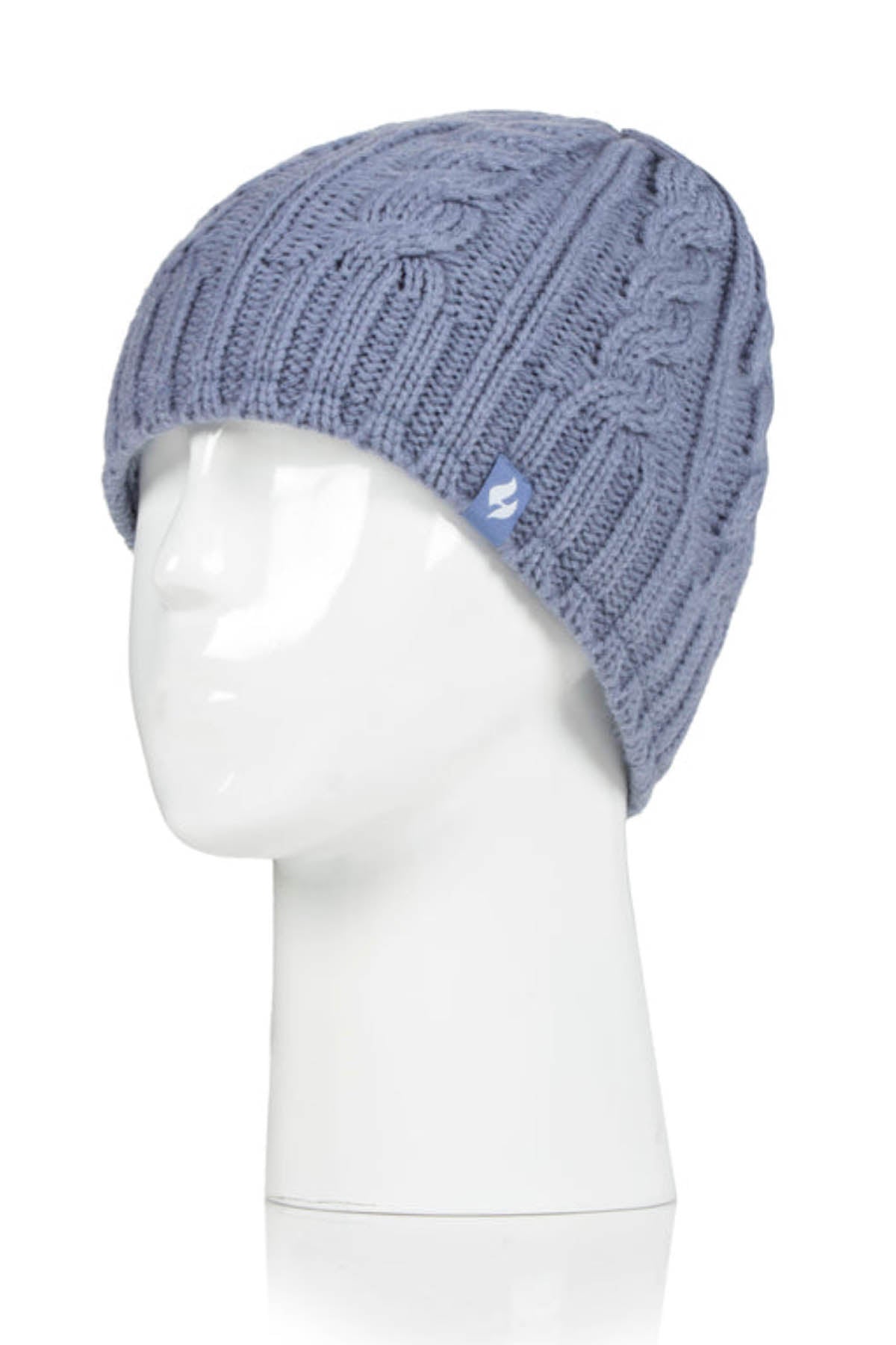 The Heat Holders Alesund Ladies Thermal Beanie, a gray knitted thermal beanie with a cable knit pattern, is displayed on a white mannequin head. The beanie features a small blue tag on its side and boasts HeatWeaver® plush lining for extra warmth.
