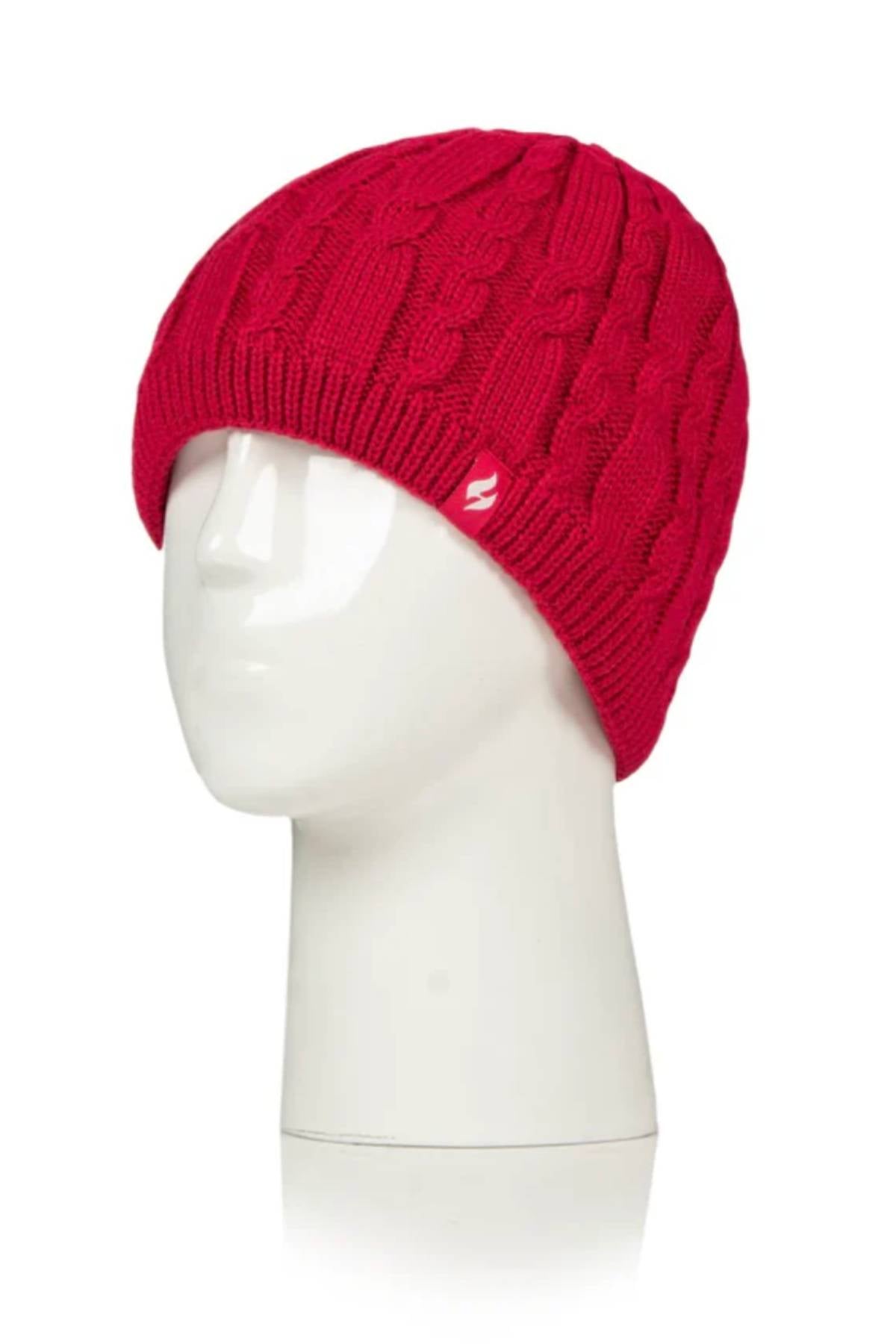 A mannequin head displays the Heat Holders Alesund Ladies Thermal Beanie in bright red, made from high-performance thermal yarn with a small white logo on the side, set against a plain white background.