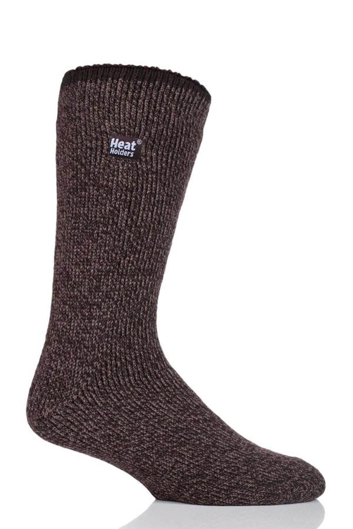 The Heat Holders Men's Wool Sock, in brown with a ribbed texture, stands vertically against a white background, featuring "Heat Holders" text near the top. Its thick knit is designed for warmth during outdoor activities.