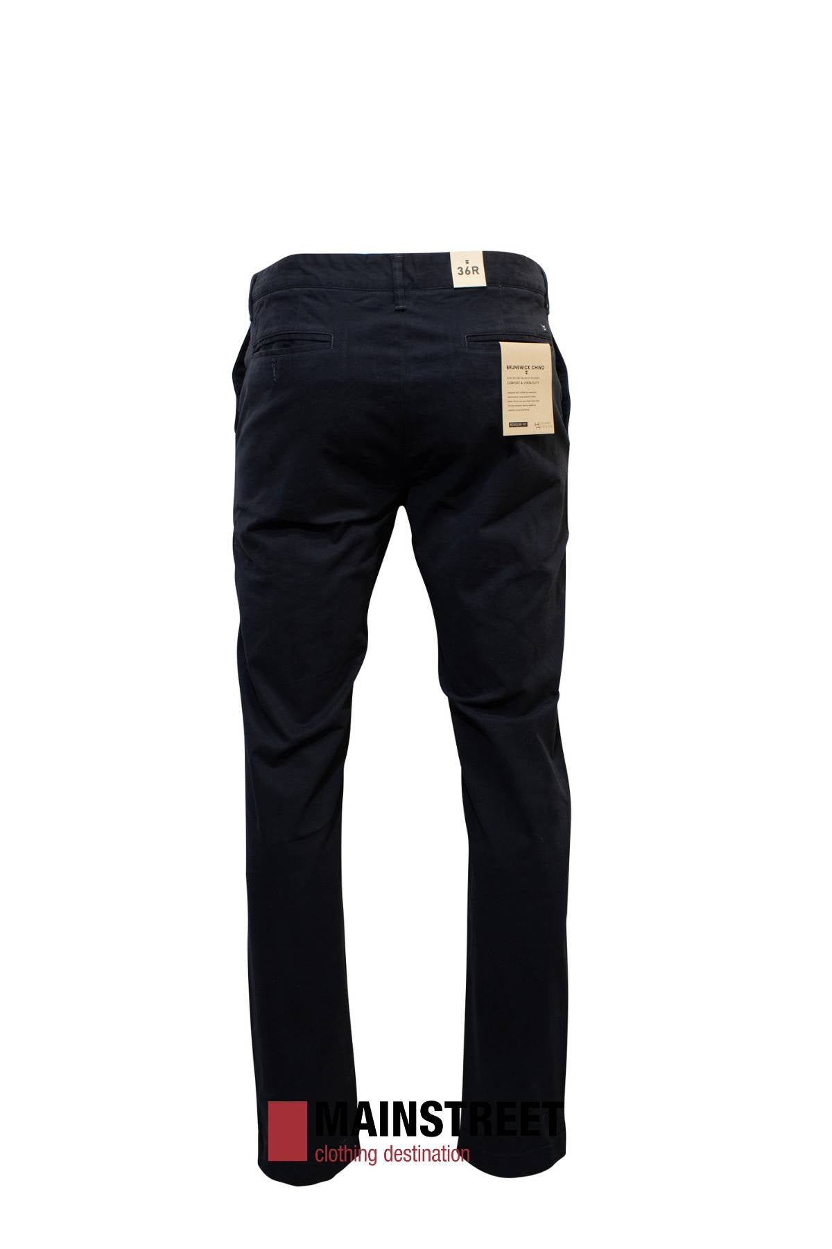 Rear view of Howard Hudson Brunswick Stretch Chino Pant with tags on a white background. Made from cotton elastane for a modern fit, with "MAINSTREET clothing destination" visible at the bottom.