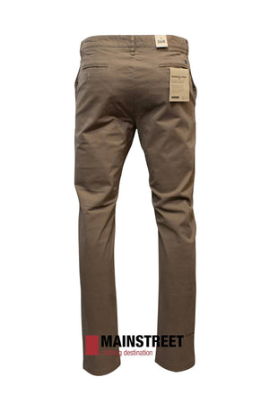 A back view of the Howard Hudson Brunswick Stretch Chino Pant in brown, featuring two rear pockets and tags near the waistband. Modern fit, stylish and practical. "MAINSTREET clothing destination" logo shown at the bottom.