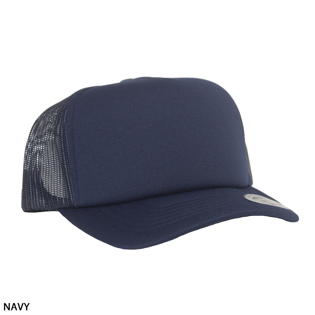 The FlexFit High Crown Trucker is a navy blue polyester nylon cap with a solid front, mesh back for breathability, curved brim, and adjustable snap-back for the perfect fit. "NAVY" appears in the bottom left corner. Shown angled.