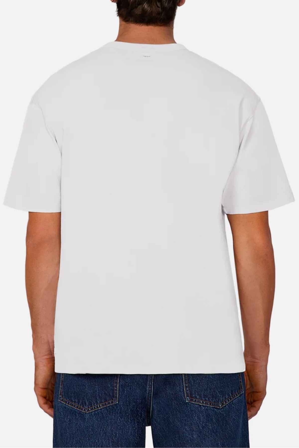 A person facing away, wearing an oversized fit Industrie The Del Sur Tee in plain white and paired with blue jeans against a white background. This comfortable T-shirt is crafted from 100% cotton, ensuring both style and ease.