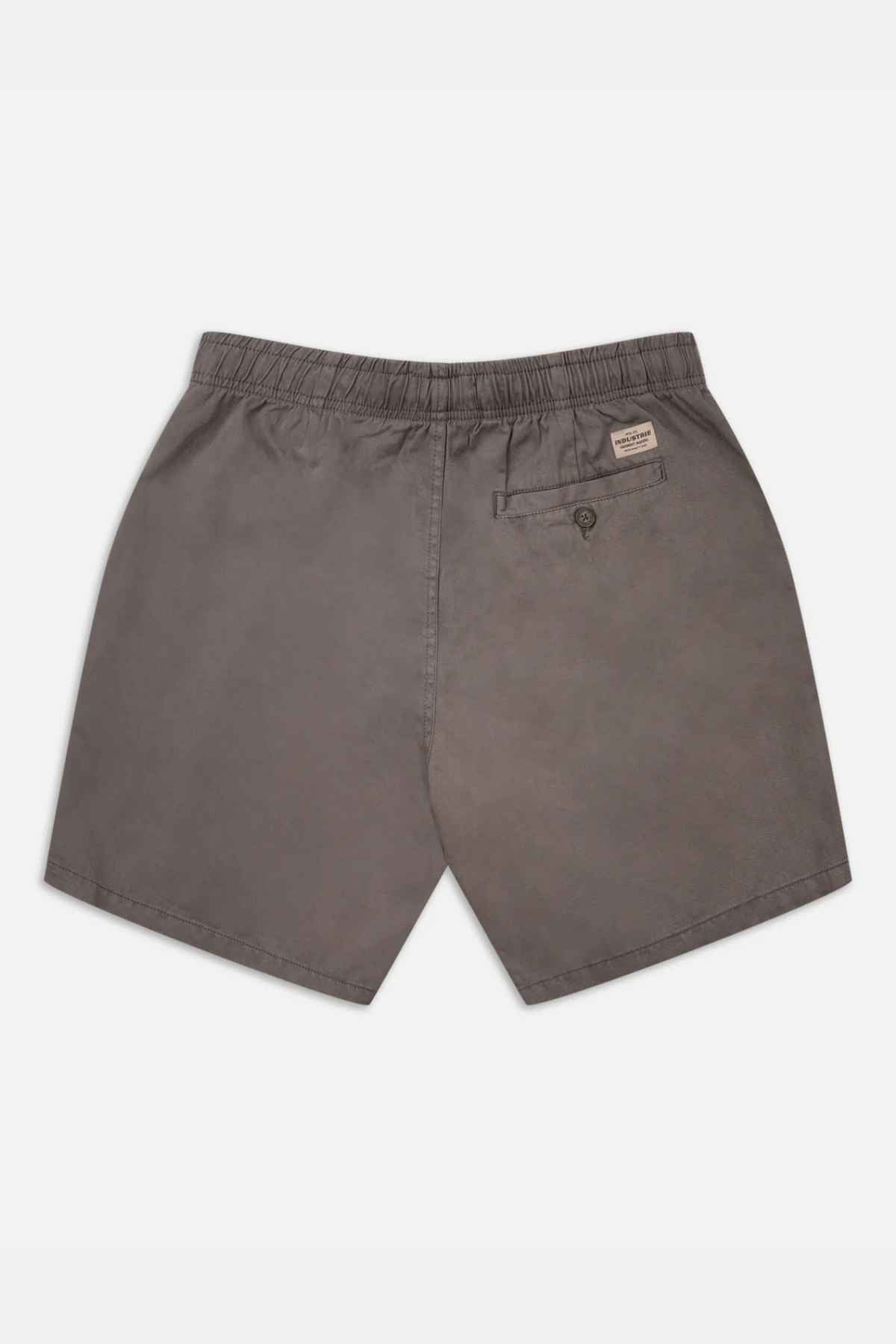 Back view of Industrie The Dublin Short in dark gray, featuring an elastic waistband, a buttoned back pocket, and a small label above it. Made from lightweight material, this versatile summer staple is perfect for warm-weather adventures.