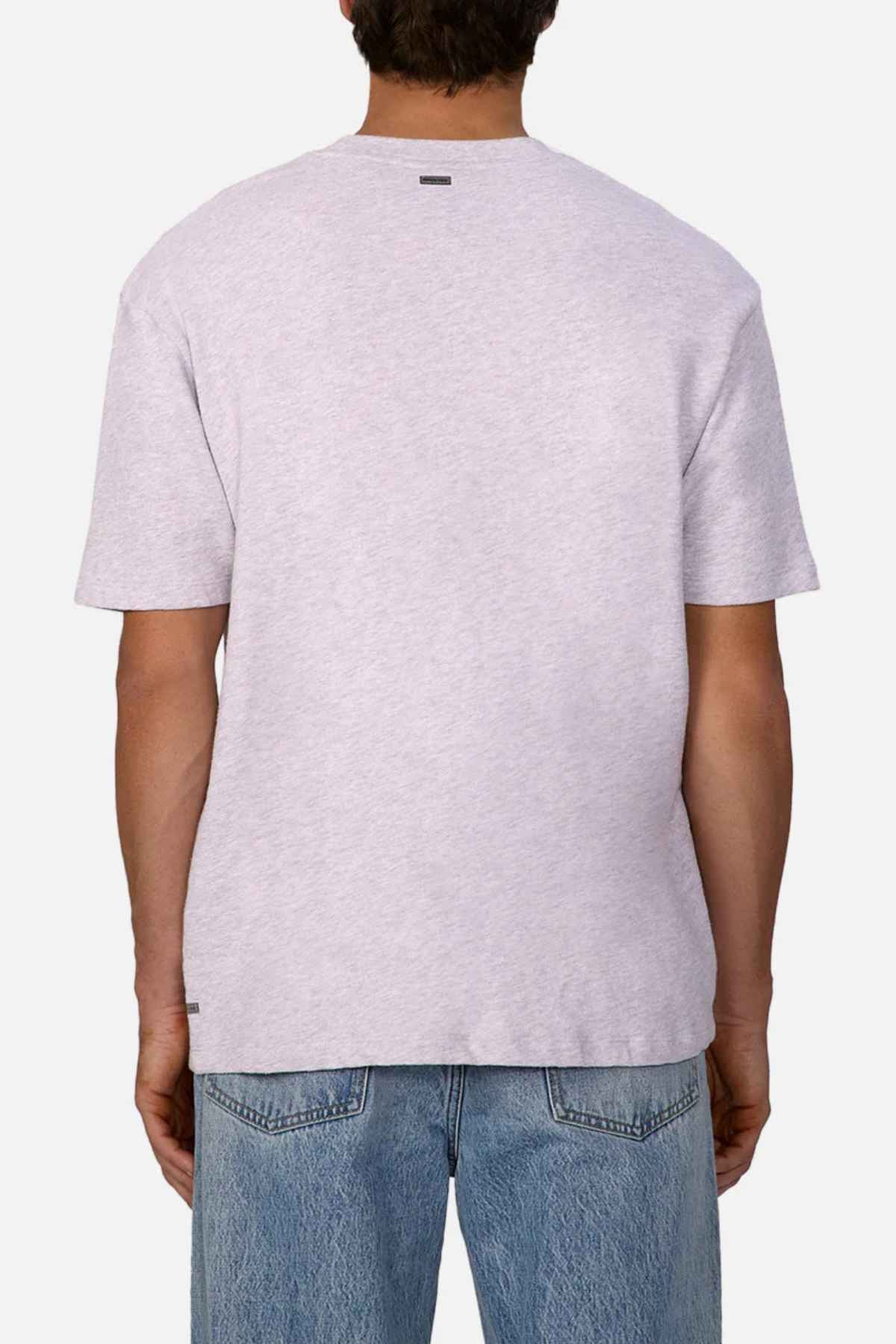 A person with dark hair, facing away, is showcasing an oversized look featuring a light gray Industrie The Henderson Boucle Tee made from 100% cotton, paired elegantly with blue jeans against a plain white background.