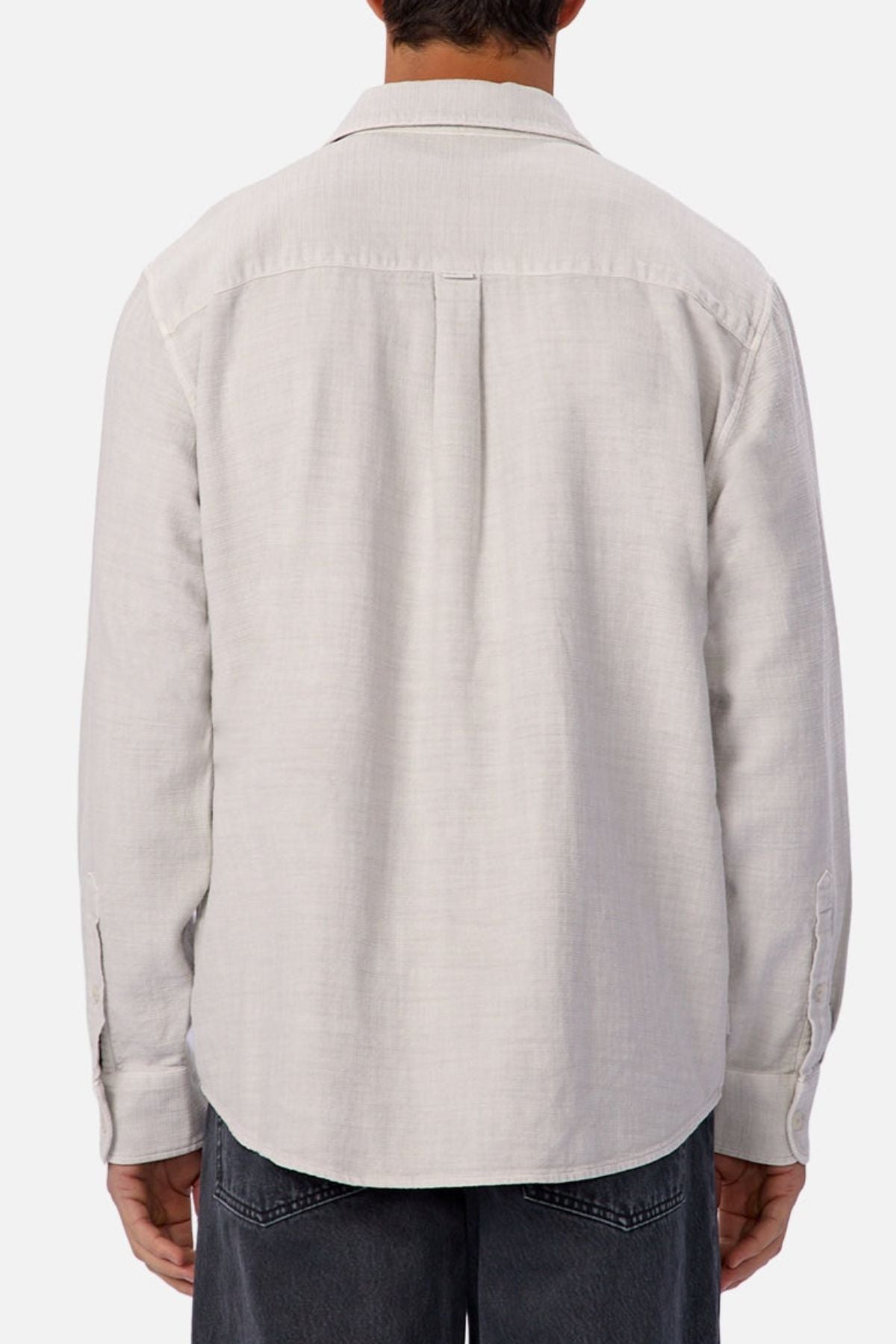 A person is shown from the back, wearing the Industrie Lisbon Long Sleeve Shirt with a classic collar made of 100% cotton in light gray and paired with dark gray pants, standing against a plain white background.