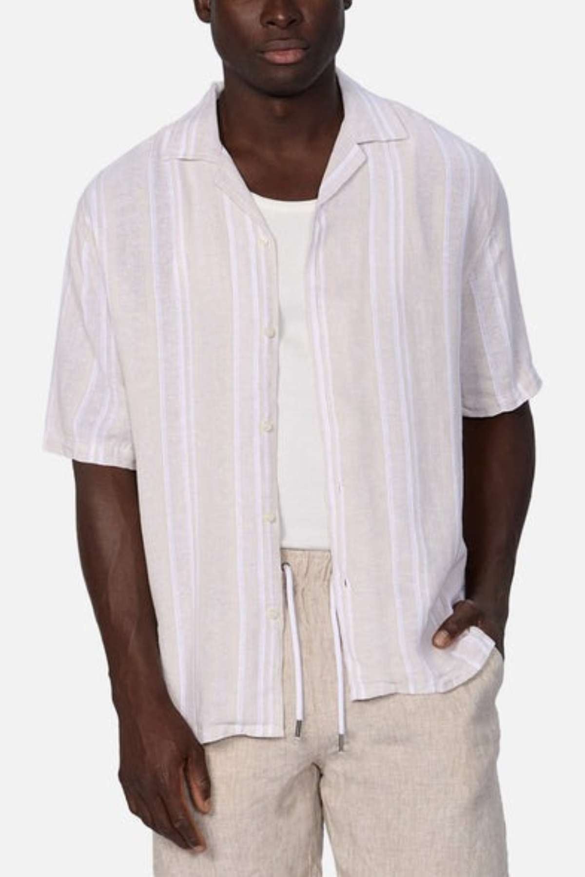 Industrie the Castino short sleeve Shirt - Cream in colour with white stripes - modelled with warm coloured shorts and an open front relaxed look
