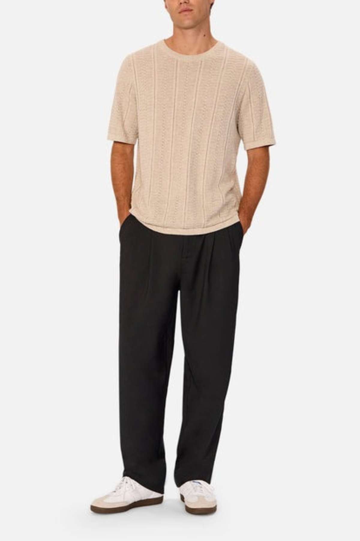 Industrie - The Nimes Tee - Chalk Marle - Front facing image - Man wearing the shirt with brown trousers