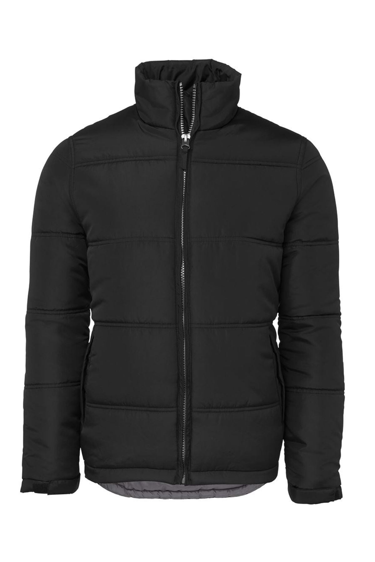 The JBs Adventure Jacket is a black, lightweight polyester outdoor jacket with a high collar, front zipper closure, horizontal stitching, and long sleeves—ideal for braving chilly adventures in style.
