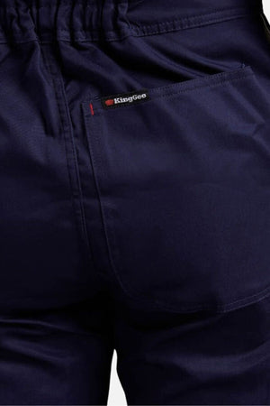 Close-up of the back of dark blue King Gee Combination Drill Overall, highlighting durable craftsmanship with detailed back pocket, waistband, and King Gee label above the pocket.