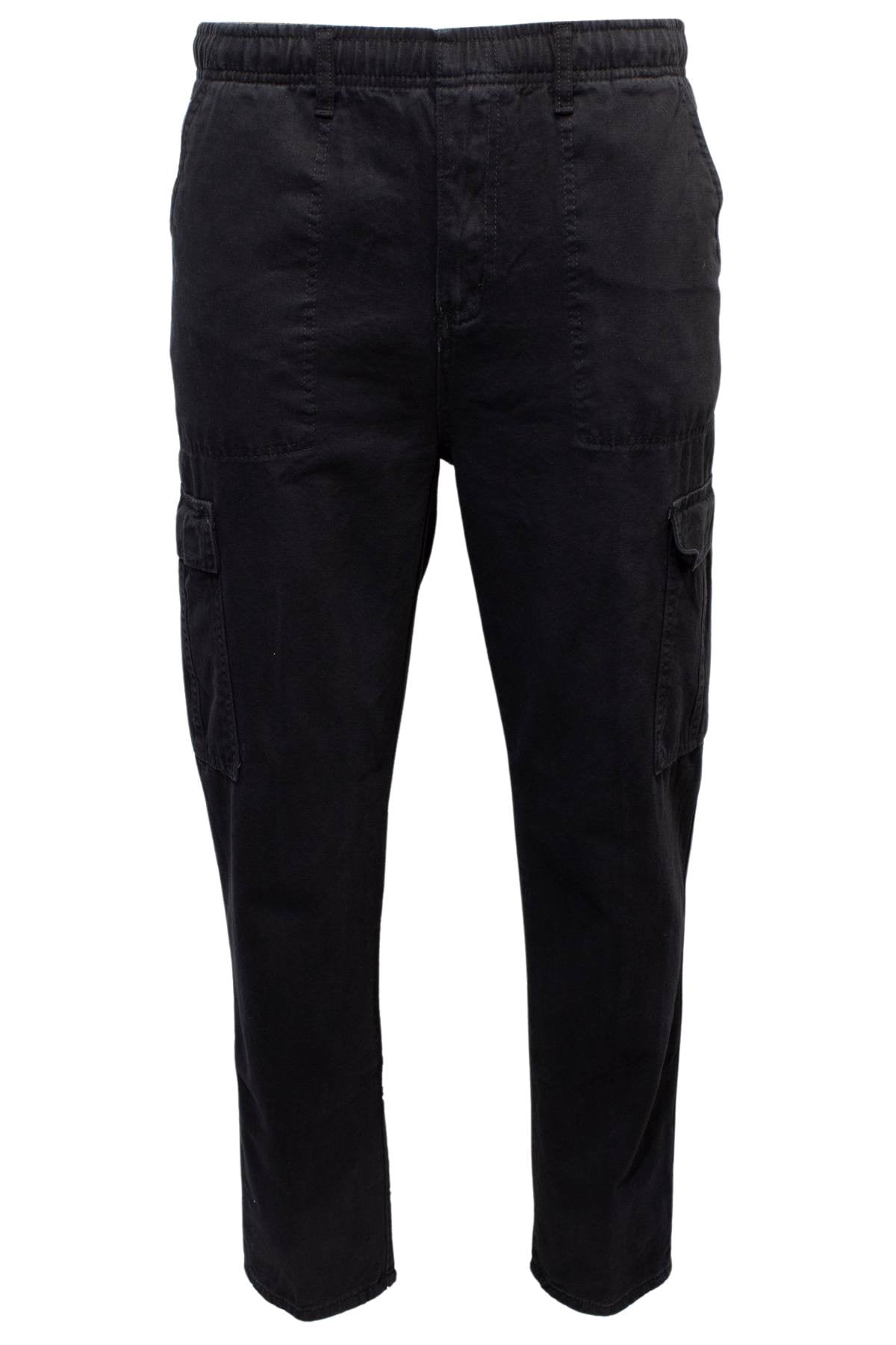 Label One Traveller Cargo Pant in black cotton with an elastic waistband, side and cargo thigh pockets, shown against a white background.