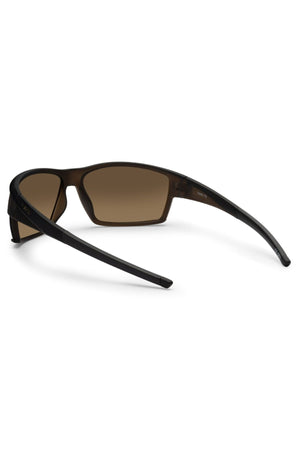 The Liive X Ignite X Sunglasses feature a black wrap-style frame and brown-tinted lenses, displayed from the rear with arms extended—ideal for everyday wear.