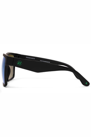The Liive X Pulse X Polar Sunglasses feature a lightweight nylon frame, thick side arms, a green "H" logo on the hinge, and a small green "x" on the temple tip for stylish, impact-resistant comfort all day.