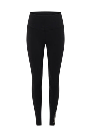 The Lorna Jane Lotus No Chafe Full Length Leggings are plain black, high-waisted leggings with a fitted design for friction-free movement. A small white logo appears near the bottom of the left leg. Shown on a white background.
