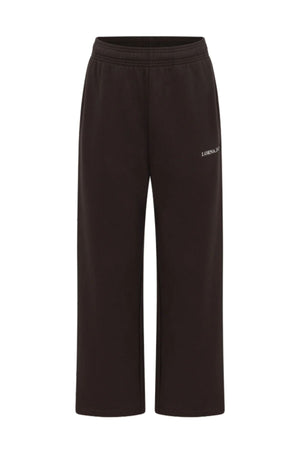 Lorna Jane Streamline Sweatpants in black with a relaxed fit and elastic waistband, featuring a small white text logo on the left thigh, shown against a plain white background.