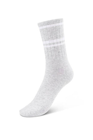 The Lorna Jane Lotus Crew Sock, shown upright on a white background, is light gray with ribbed texture and two white stripes near the top. Made from breathable cotton for comfort and sporty style.