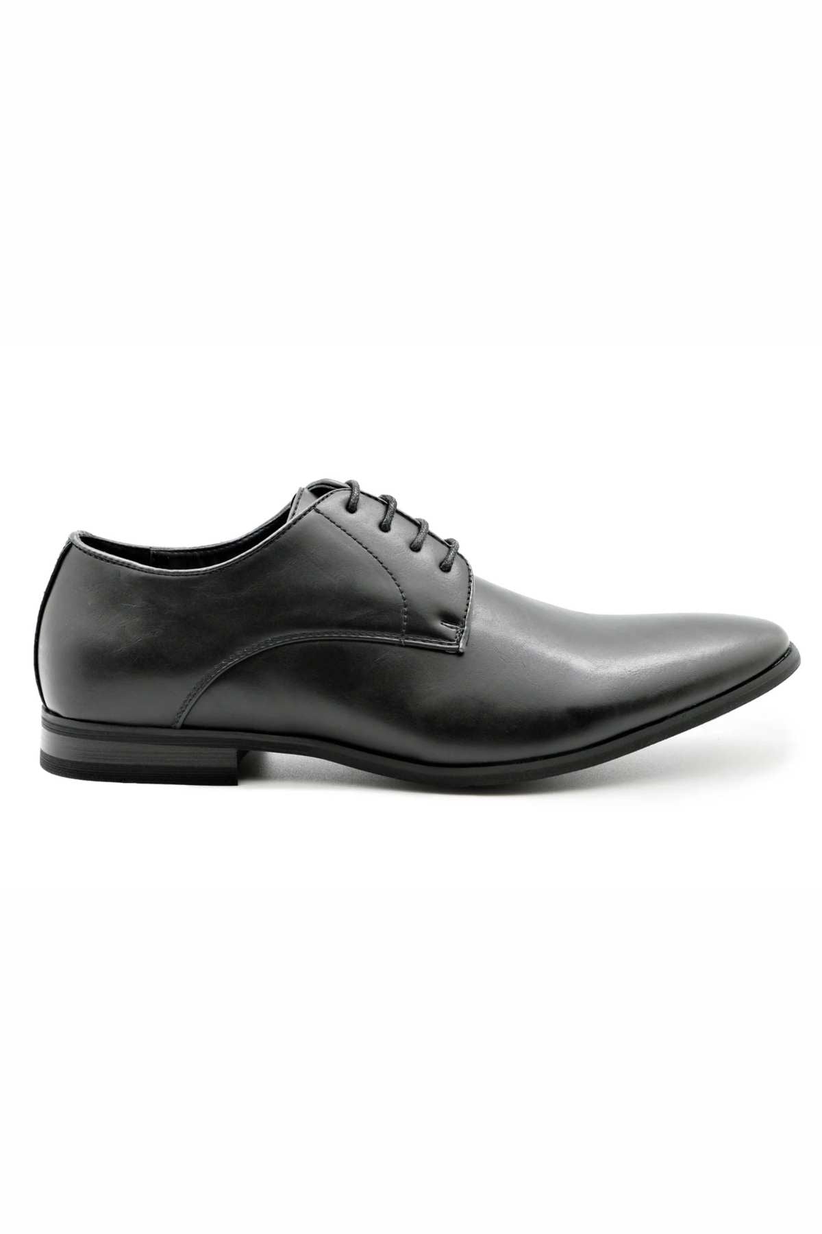 The Messa Pisa Shoe is a vegan-friendly black formal shoe with a sophisticated design. It boasts a smooth leather finish, lace-up closure with five eyelets, and a slightly pointed toe. The thin black sole perfectly complements its sleek appearance.