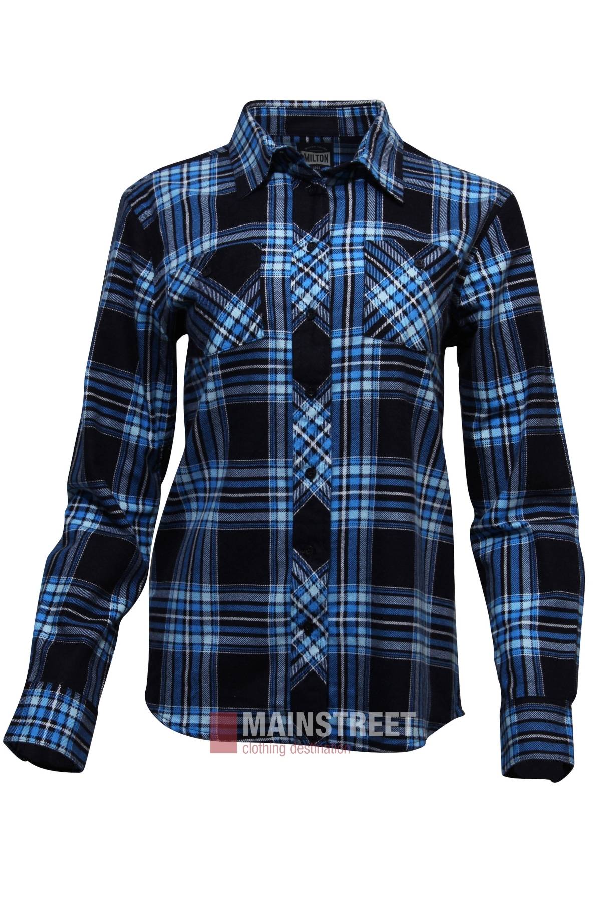 The Milton Ladies Flannelette Shirt is a long-sleeved, button-up shirt in blue, black, and white plaid. Made from high-quality cotton, it features a collar, chest pockets, ladies sizing, and the "Mainstreet" brand at the hem.