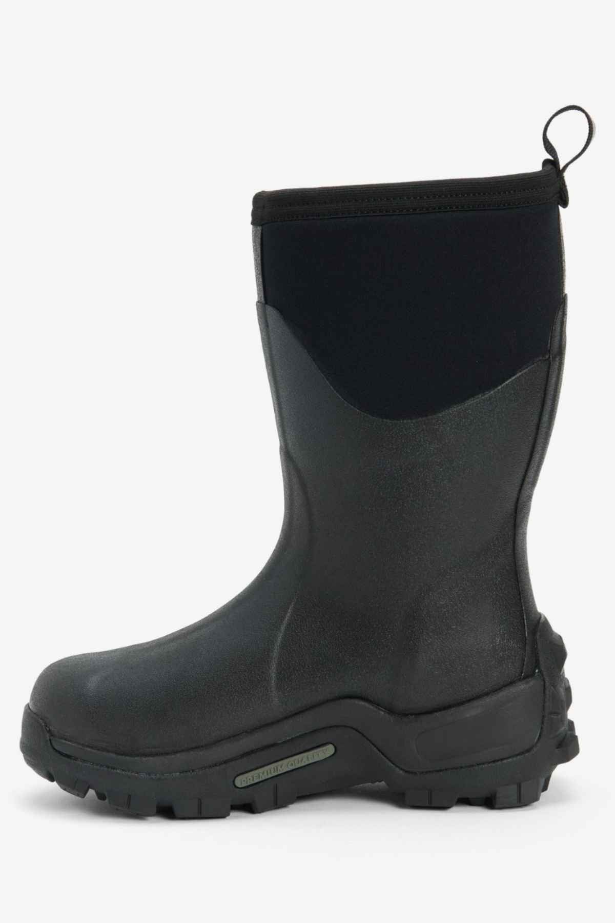 The Muck Boot Muckmaster Mid Boot, featuring a black waterproof design and a flexible neoprene upper section, is showcased against a white background. It includes an MS-1 molded outsole and has a pull-on loop at the top for easy wearing.
