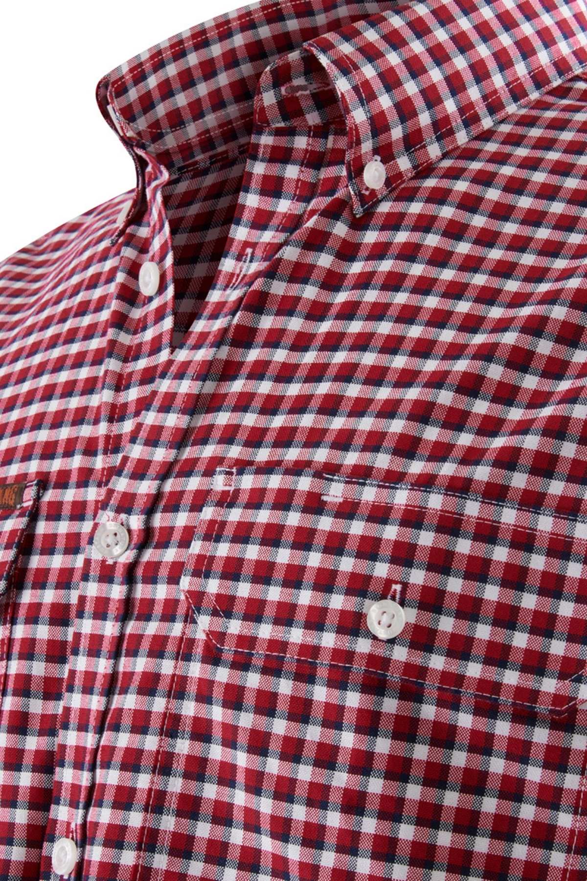 Close-up of the Mustang Signature Check Shirt with a red and white checkered button-up design. Featuring white buttons, two chest pockets, and a collar, this high-quality cotton shirt boasts a plaid pattern with blue and black lines running through the red and white checks.