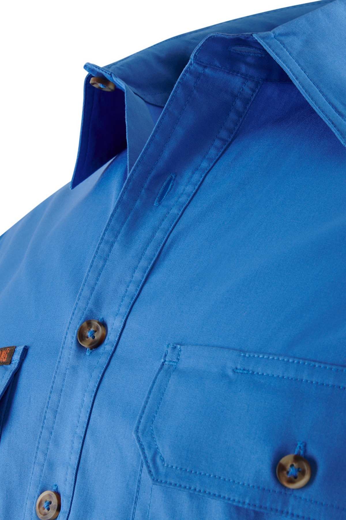 Close-up of a vibrant blue Mustang Signature Closed Front Workshirt for men, featuring brown buttons. The front pocket has a flap and button closure. Made from durable cotton, stylish stitching details add flair, and a slight sheen enhances its rich color.