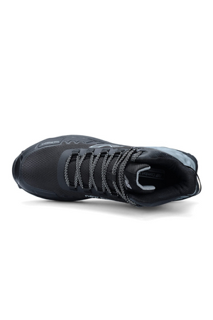 Top view of the New Balance Cremorne Mid Safety Shoe in black with grey accents, patterned laces, mesh upper, visible branding on tongue and side, and a slip-resistant sole for enhanced safety.