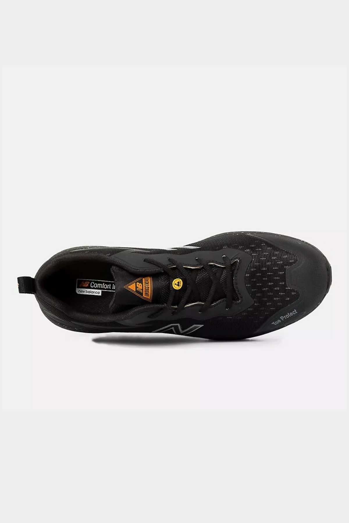 Top view of the New Balance Logic Safety Work Shoe in black, showcasing its mesh upper with a slight pattern, black laces, and a pull tab on the heel. The interior features a "Comfort Insert" label. Subtle brand markings and a partially visible sole enhance its aesthetic. This slip-resistant safety shoe also includes a kevlar midsole for added protection.