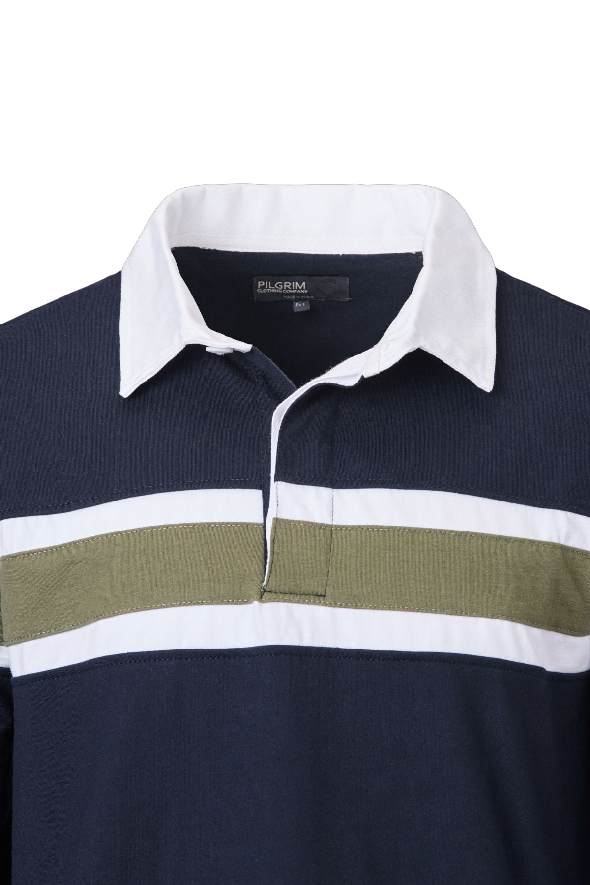 The Pilgrim Rugby Top is a navy blue shirt with a white collar and a horizontal white and olive green chest stripe, featuring classic vintage-inspired styling and a partial button placket.