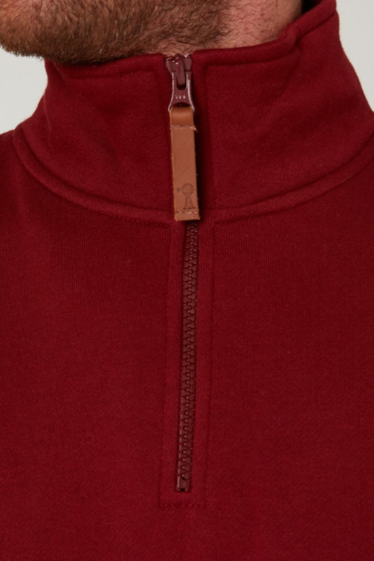 A zipper on the Pilbara Classic Fleece Pullover adds a modern touch, while its cozy fleece lining ensures warmth and comfort.