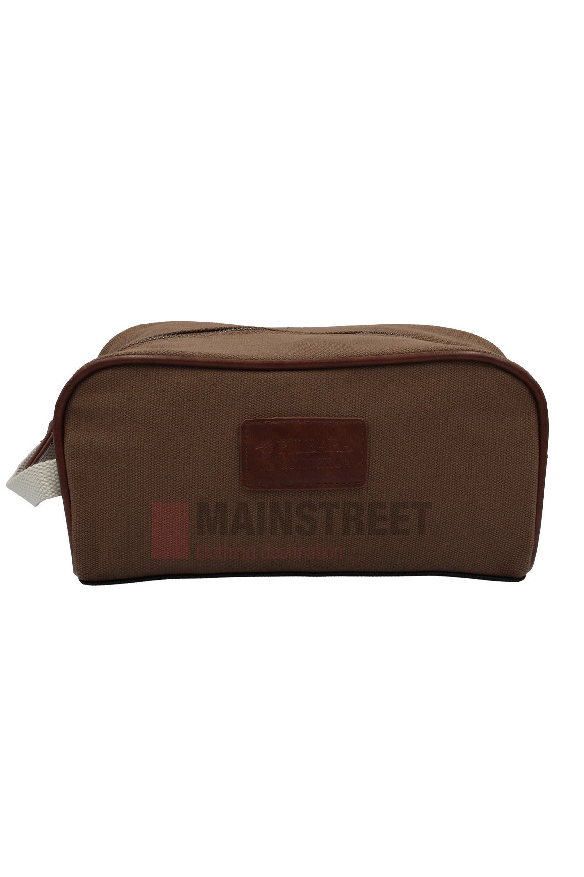The Pilbara Toiletry Bag is a rectangular brown premium canvas bag with a zipper, leather front patch, and white fabric handle on the left side. Its plain design is shown against a white background.