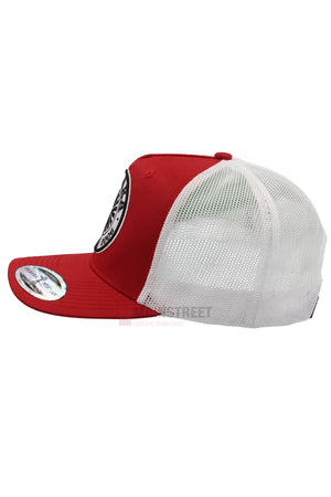 The Pilbara Western Established Cap features a red and white design, round embroidered front logo patch, breathable mesh back, flat brim with sticker, and is displayed in side profile.