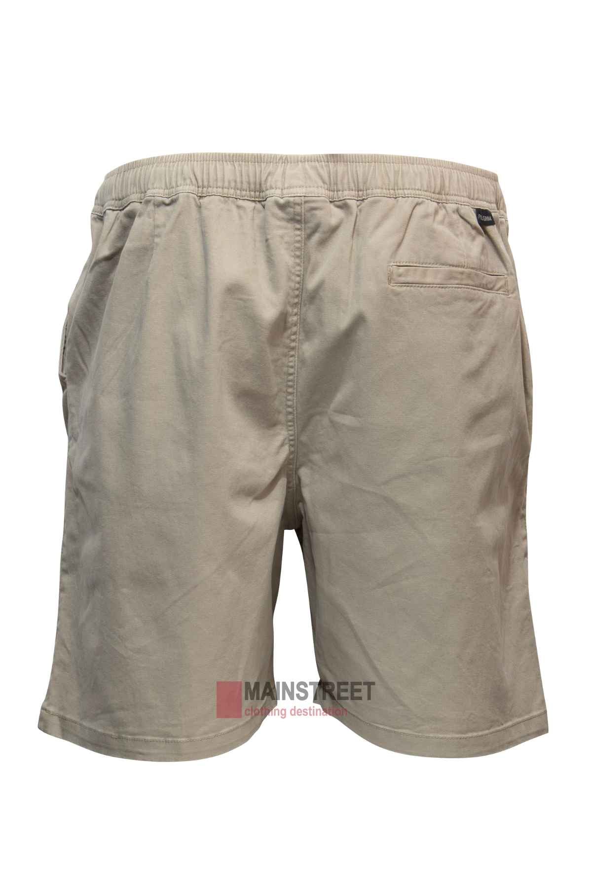 The Pilgrim Elastic Waist Short in beige is showcased from the back, made with lightweight fabric that’s ideal for a casual day out. It includes two side pockets and one pocket on the right back side, laid flat to clearly highlight the design.