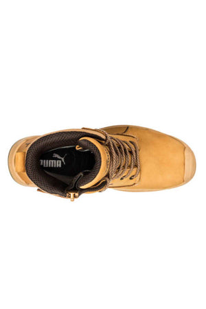 Top view of a single tan-colored Puma Conquest Waterproof Safety Boot featuring brown laces. The interior showcases a black insole adorned with the Puma logo. Its padded collar and lining offer enhanced comfort, while the robust design, heat-resistant outsole, and fibreglass toe cap make it ideal for outdoor use.