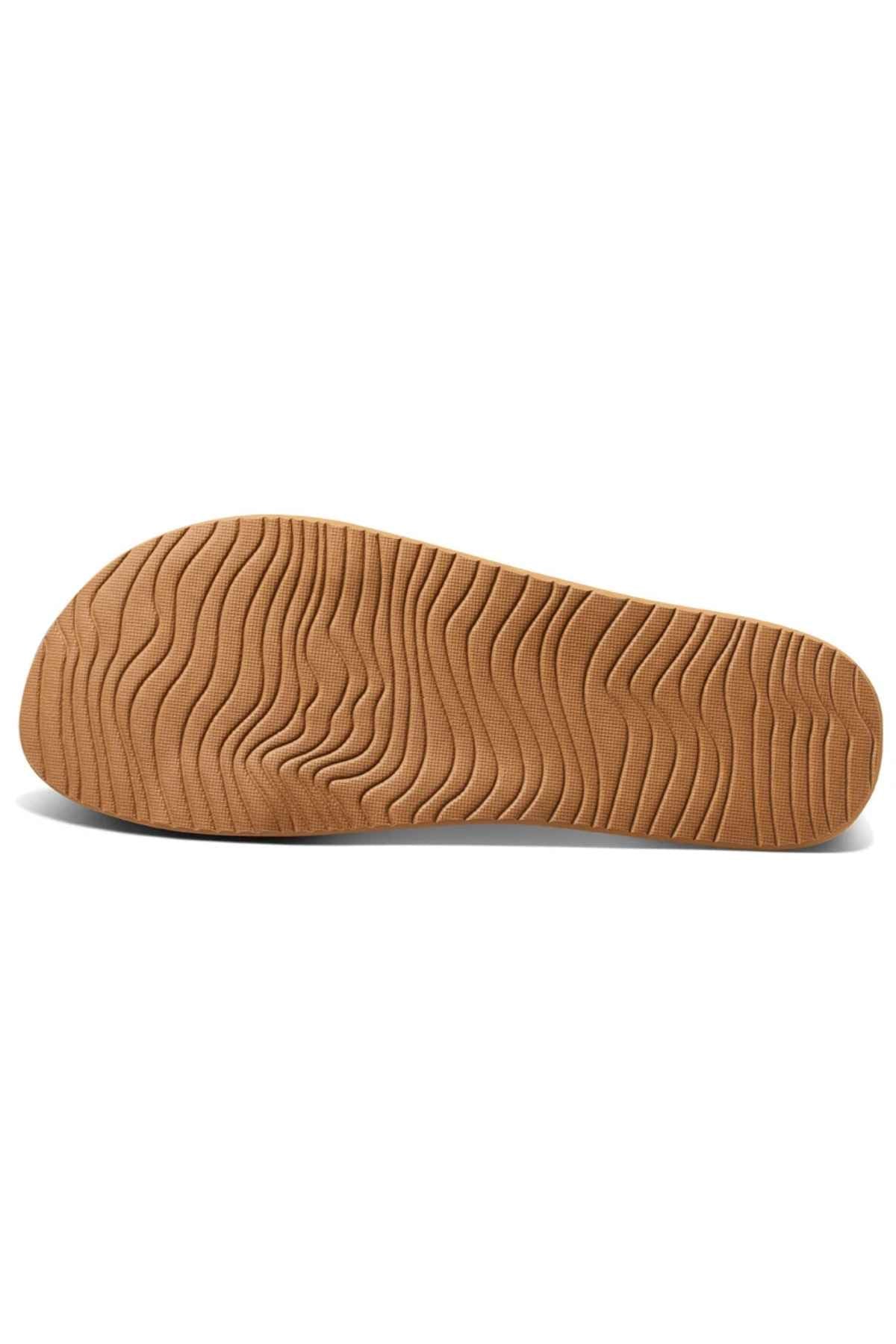 The image showcases the REEF Vista Braid II's brown sole with a wavy, textured pattern for grip. From the bottom view, it reveals the entire eco-friendly sole design and cushioned midsole for extra comfort.
