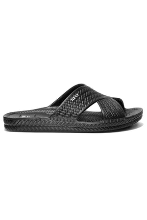 The REEF Water X Slide is a black sandal with a woven texture and open toe. It includes a treaded sole, curved strap, and non-marking sugarcane EVA footbed for comfortable steps.