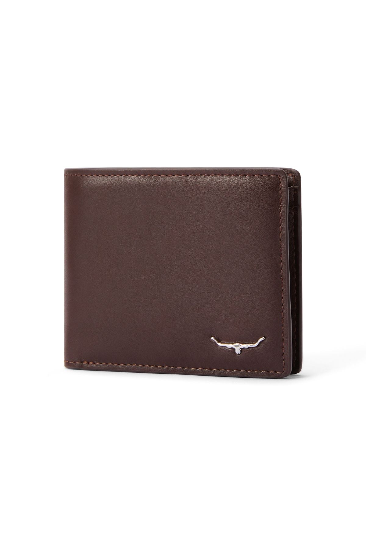 The RM Williams Bi Fold Wallet with Pocket is made from brown full-grain leather, featuring neat stitching and a small silver longhorn emblem in the lower right corner, shown against a white background.