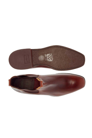 Top and bottom view of a single RM Williams Comfort Craftsman Boot in brown yearling leather with a smooth finish, slightly squared toe, rubber welt sole, and visible boot opening.