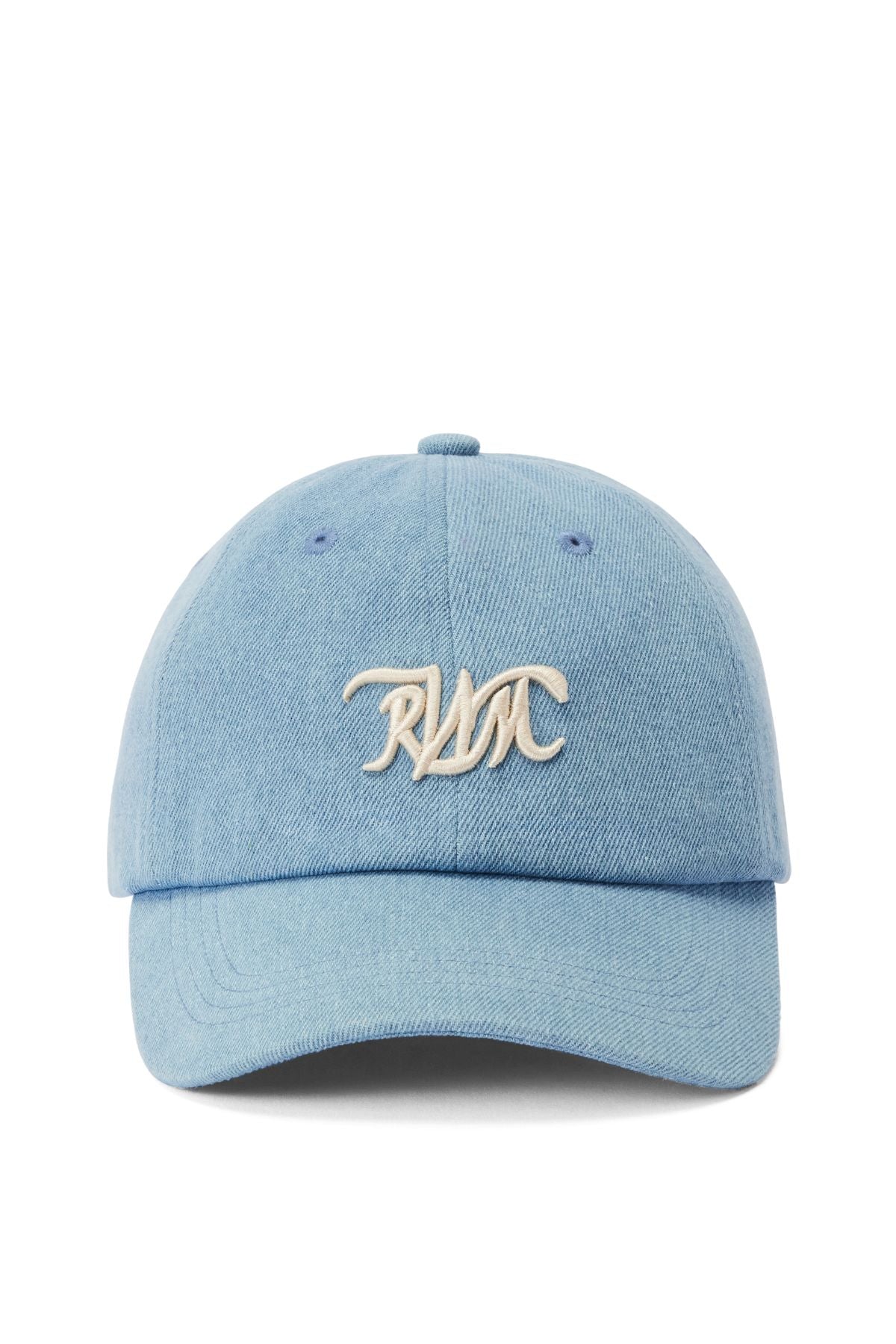 The RM Williams Cursive Twill Cap is a light blue cotton cap featuring a curved brim and white embroidered "RLX" initials on the front, crafted in the signature R.M.Williams style.