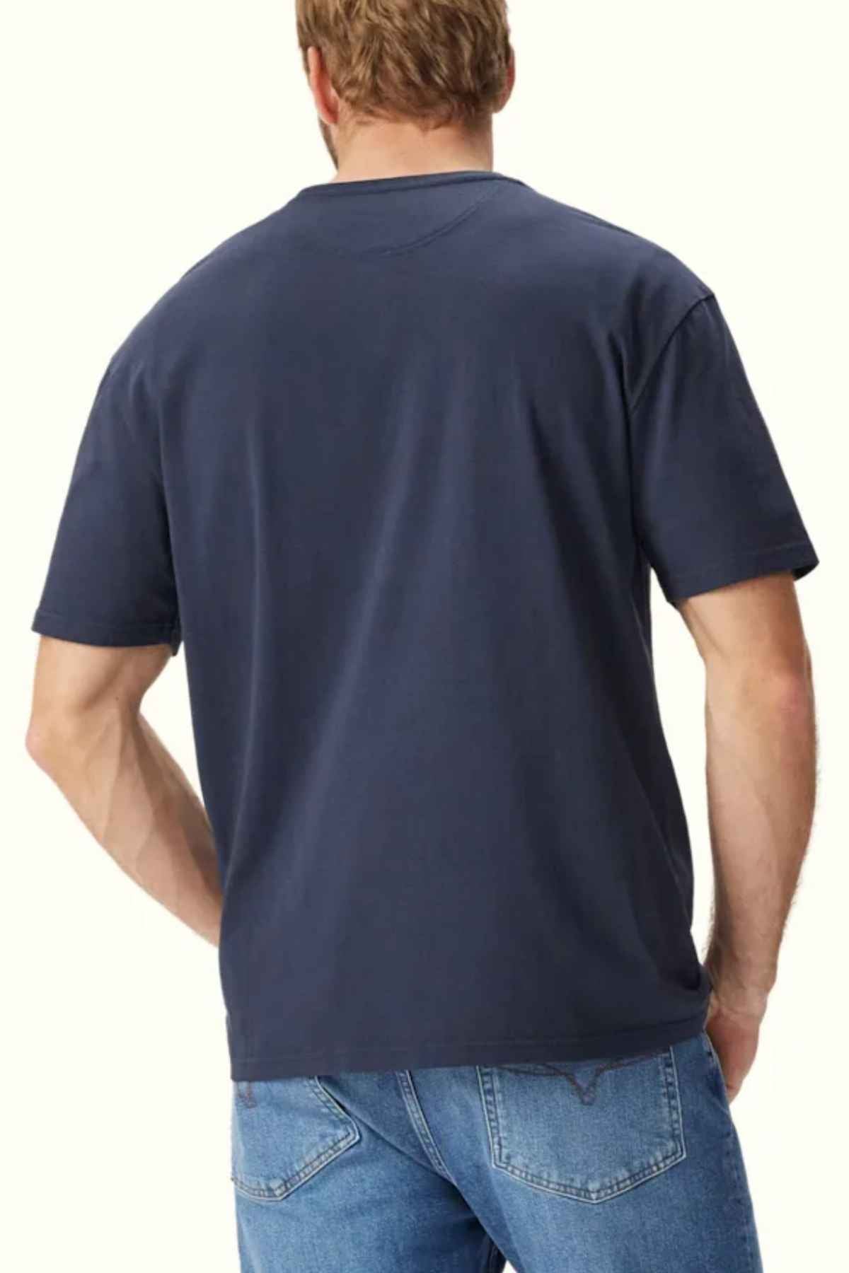 RM Williams Everything Tee in the colour Navy. Back angle of model wearing t shirt.