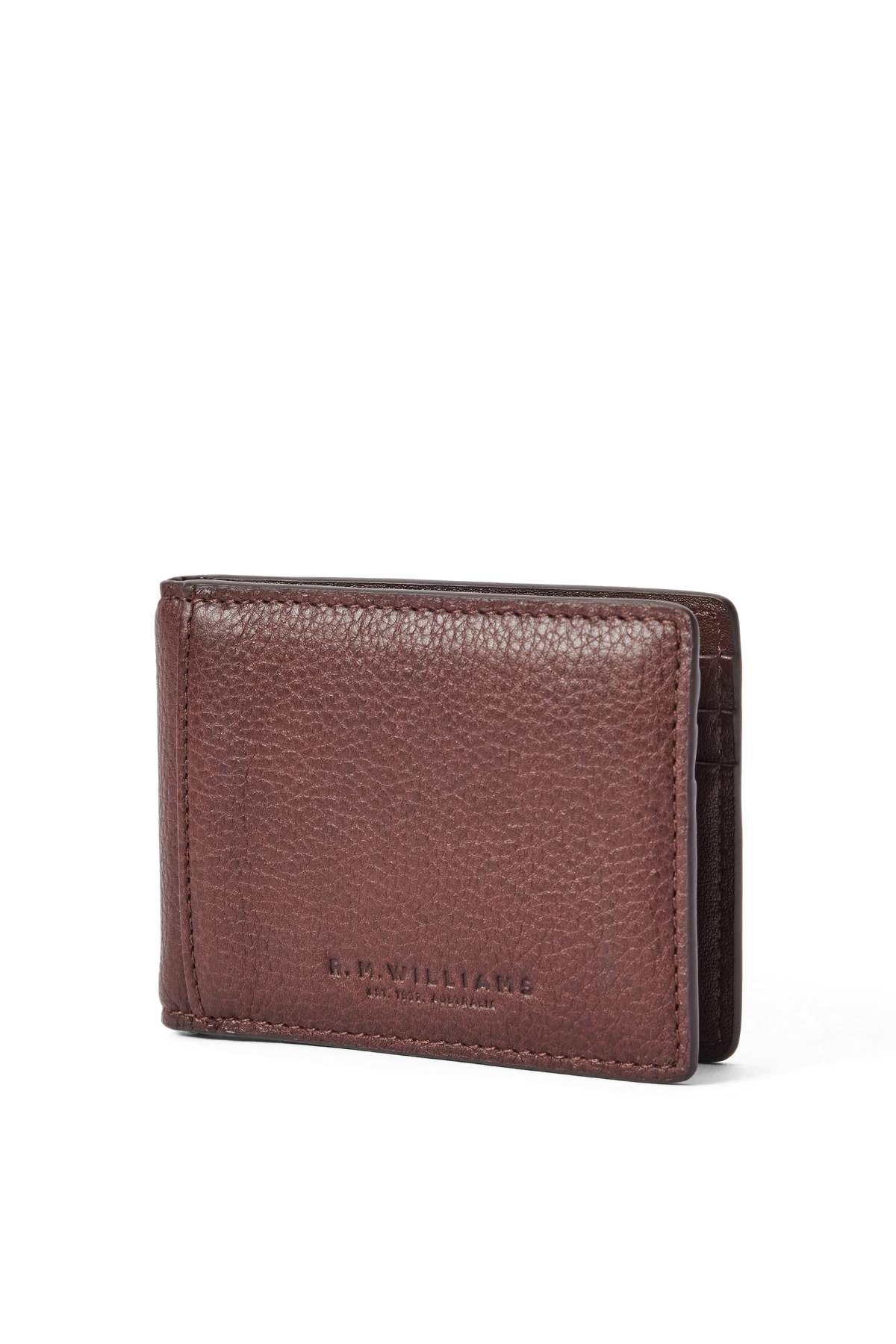 The RM Williams Farrier Bi Fold Clip Wallet features brown textured leather, "R.M. Williams" embossed on the front, a bi-fold design, and visible edge stitching.