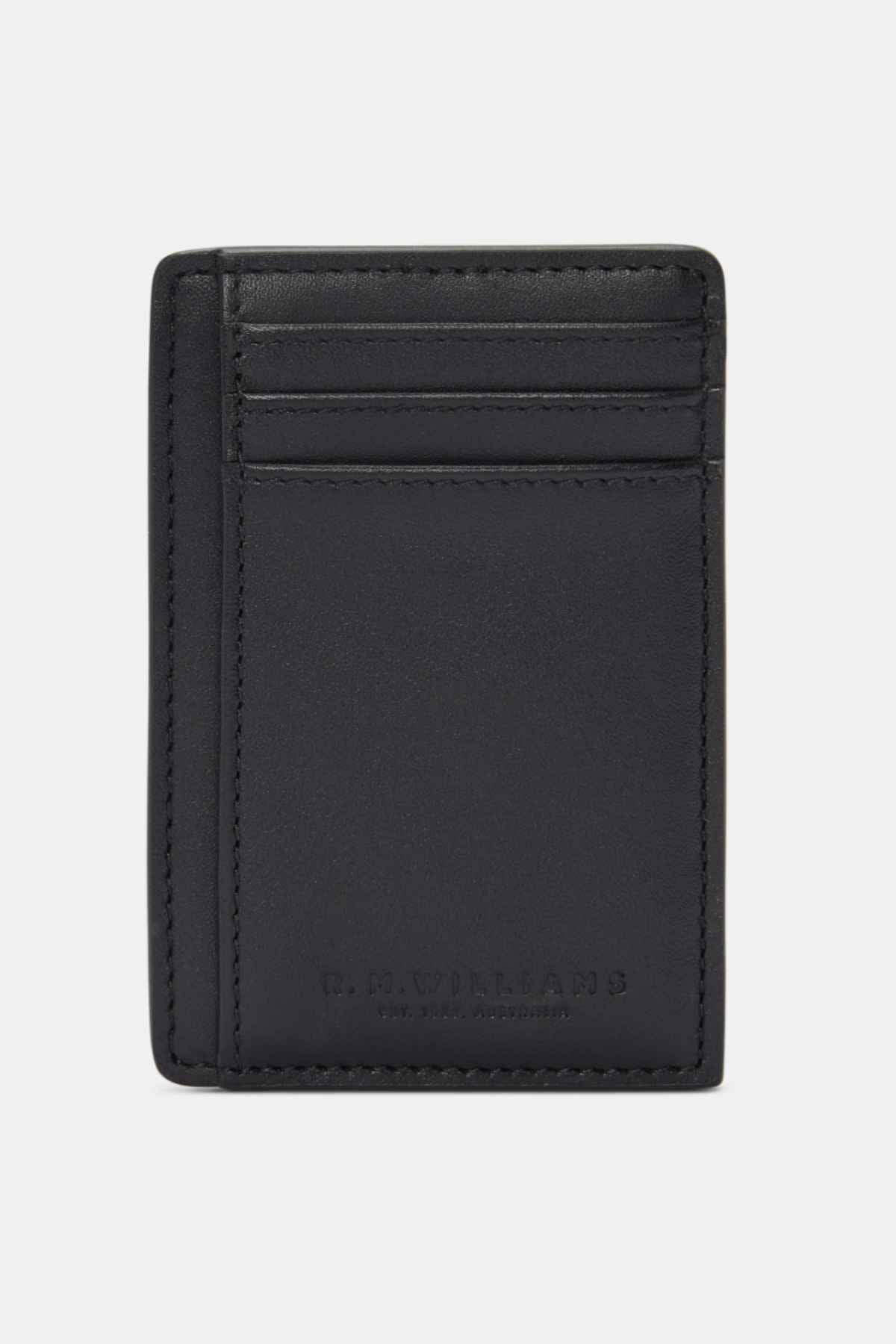 The RM Williams Farrier Cardholder with Money Clip is a black slimline wallet made from premium leather. It features three card slots on the front and embossed "R.M. Williams" text, all enhanced by a minimalist design with neat stitching.