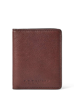 A brown leather RM Williams Farrier Fold Cardholder with a textured finish and "R.M. Williams" embossed in gold near the bottom right corner on the front.