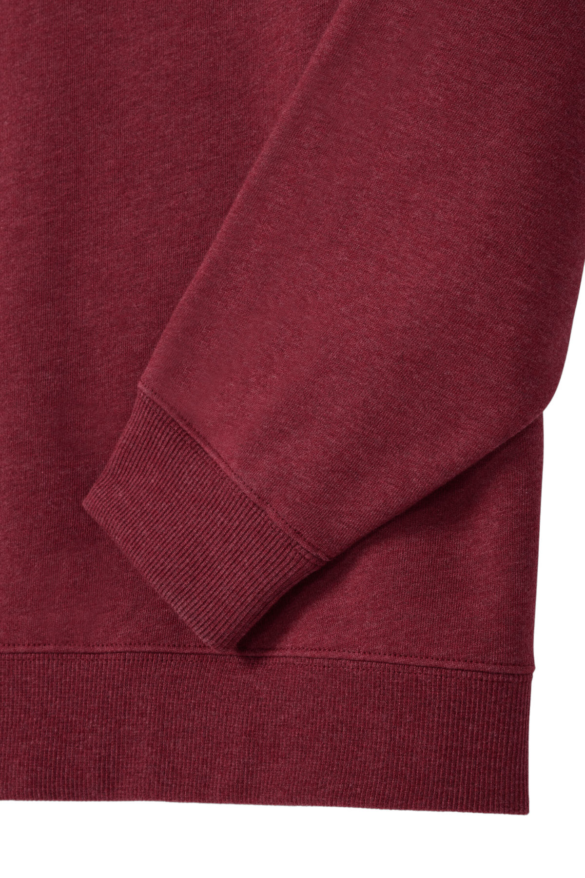 Close-up of the RM Williams Mulyungarie Fleece sleeve and cuff in maroon. The cotton fleece fabric is soft with ribbed details at the cuff and hem, perfect for comfortable, casual wear.