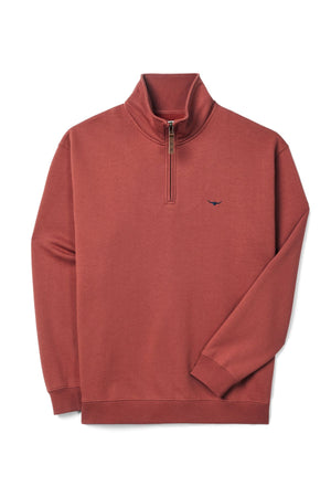 The RM Williams Mulyungarie Fleece is a brick-red organic cotton quarter zip with a relaxed fit, stand-up collar, long sleeves, ribbed cuffs and hem, plus a small embroidered logo on the left chest.