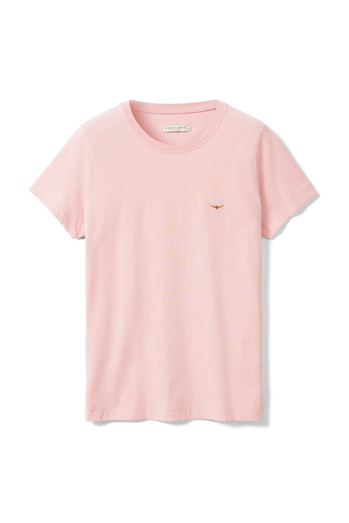 The RM Williams Piccadilly Tee is a plain light pink T-shirt crafted from Good Earth Cotton, with a small embroidered orange longhorn logo on the left chest, shown against a white background.