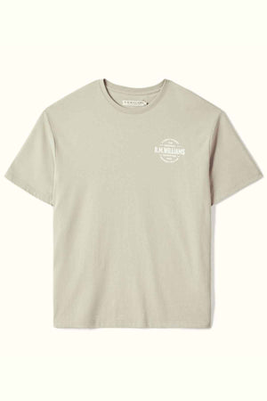 RM Williams Prospect T-Shirt in beige, crafted from organic cotton with short sleeves and a round neckline. It features a small, subtle logo on the upper left chest and offers a classic fit design for effortless style.