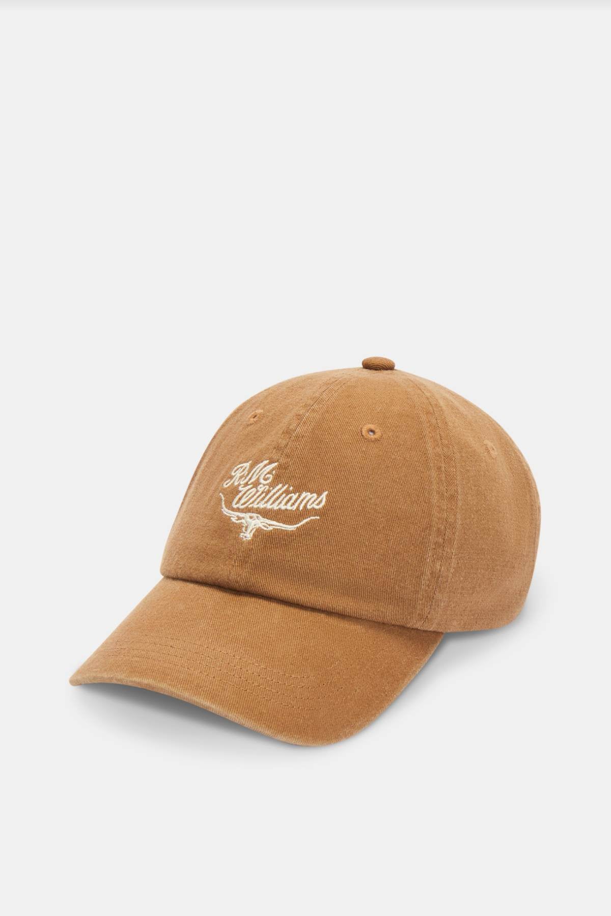 Introducing the RM Williams Script Longhorn Cap: a distinguished brown baseball cap made from premium washed cotton twill, elegantly showcasing an embroidered heritage script logo in white on its front. The cap features a stylish curved brim, all beautifully displayed against a plain white background.