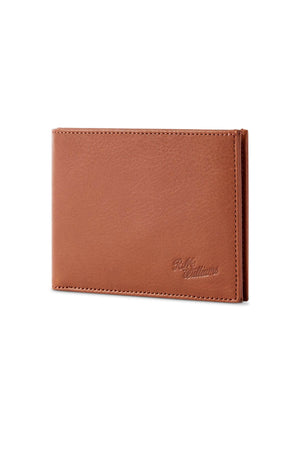 The RM Williams Singleton Bi-fold Wallet is a slimline wallet made from premium natural milled leather, showcasing a minimalist design with visible edge stitching. It features a closed style embossed with "Bells Cornelius" in the bottom right corner for enhanced style and functionality.