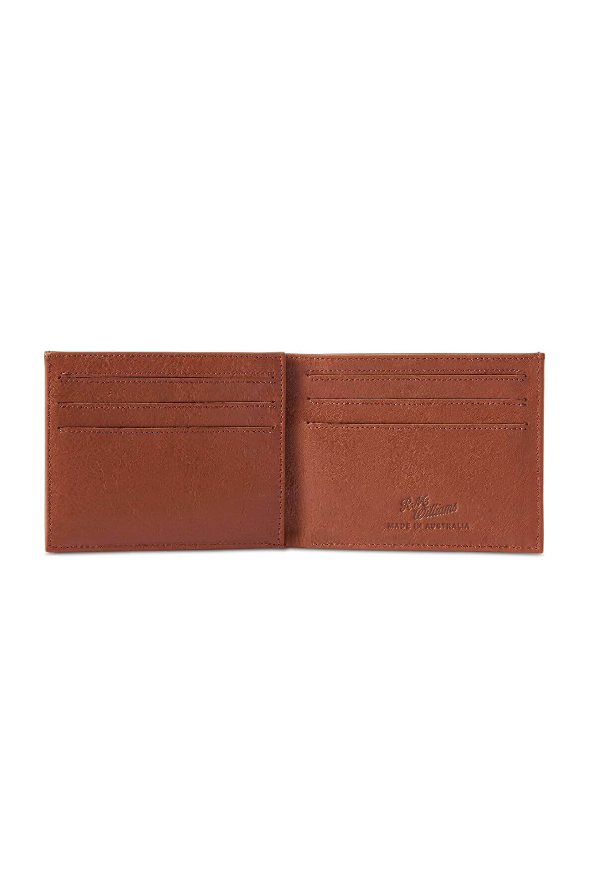 The RM Williams Singleton Bi-fold Wallet is an open tan slimline wallet crafted from premium natural milled leather, featuring multiple card slots on both sides, embossed brand text on the right side, and RFID protection against a white background.