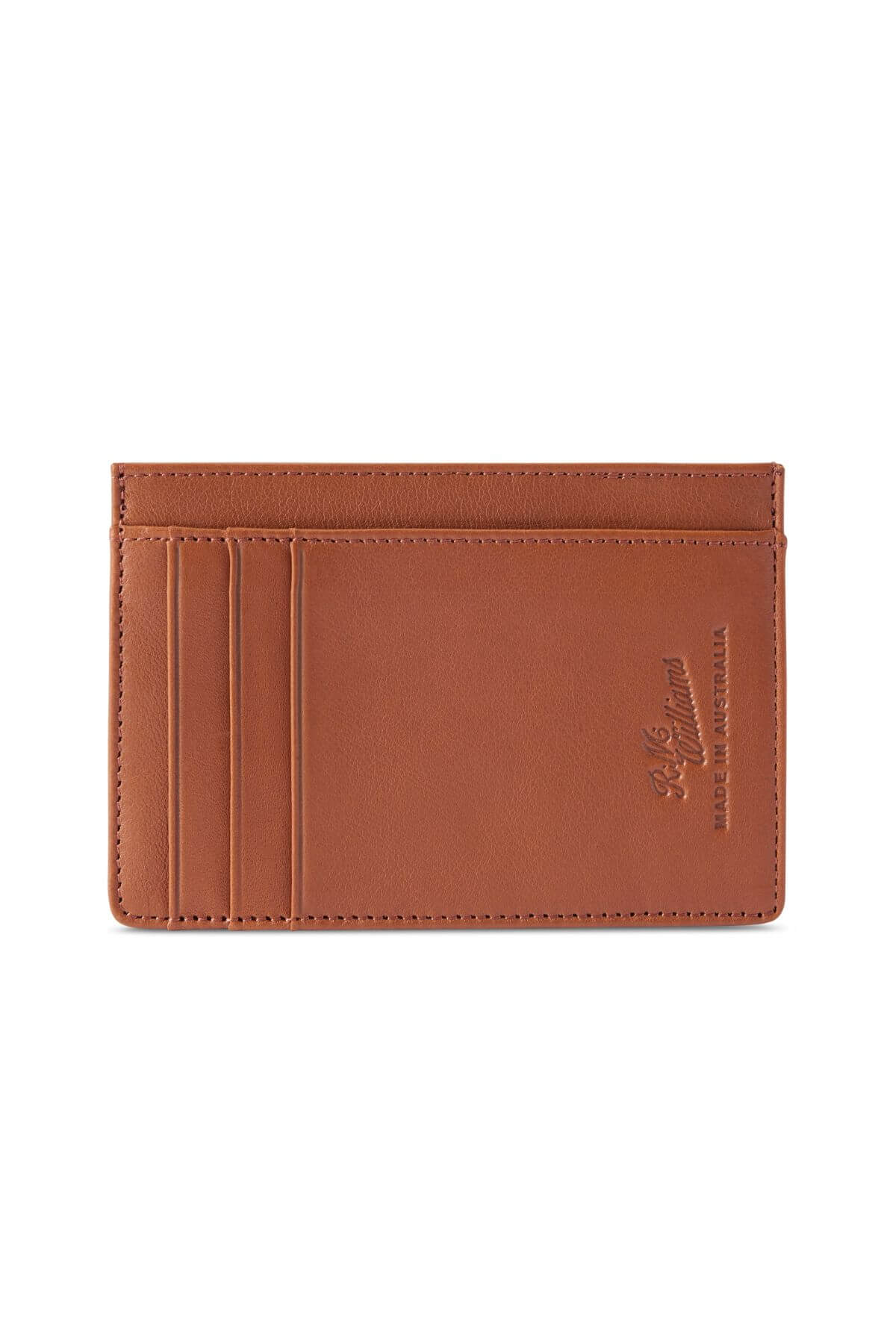 The RM Williams Singleton Vertical Card Holder is a slim brown accessory made from natural milled leather, featuring three card slots and subtle embossed branding on the lower right corner, shown against a white background.